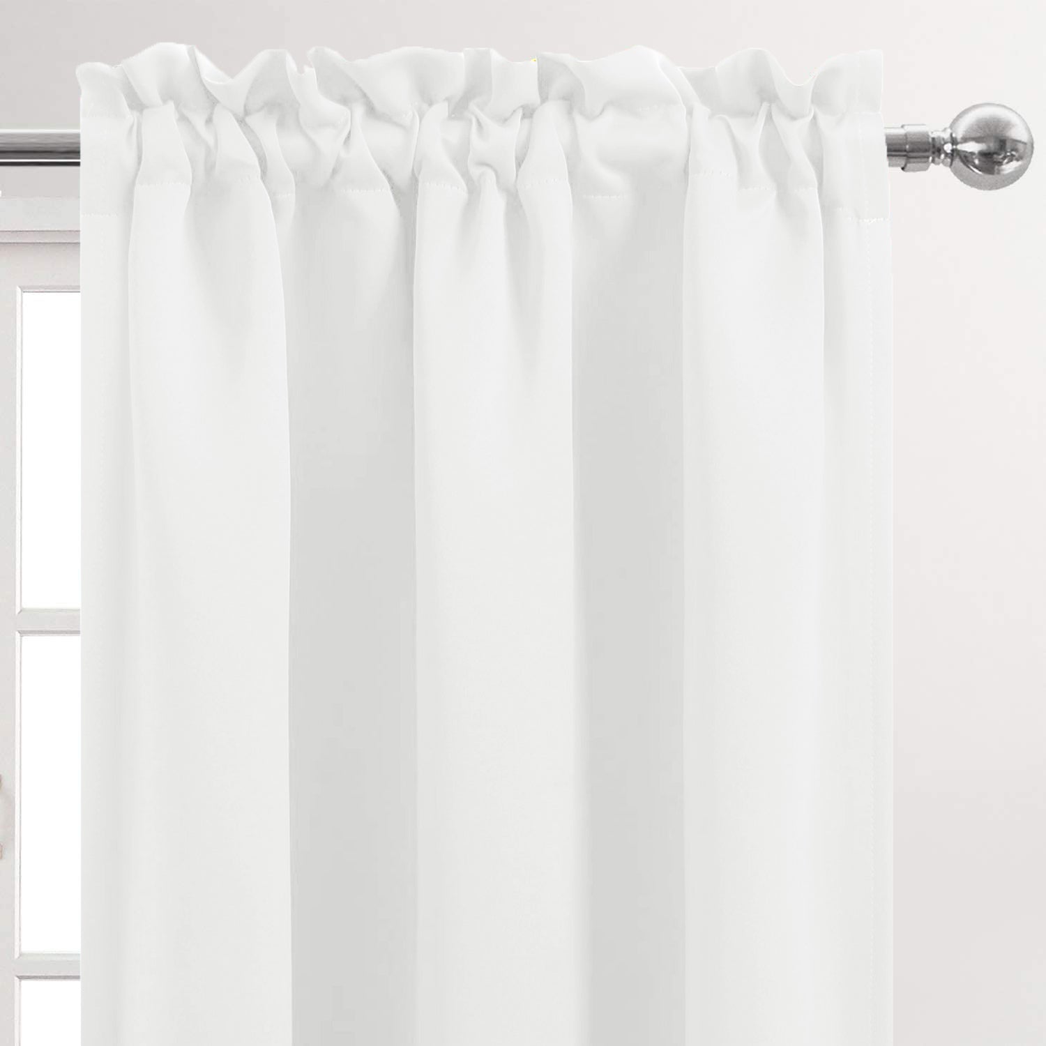 White curtain panel with a rod on a white background