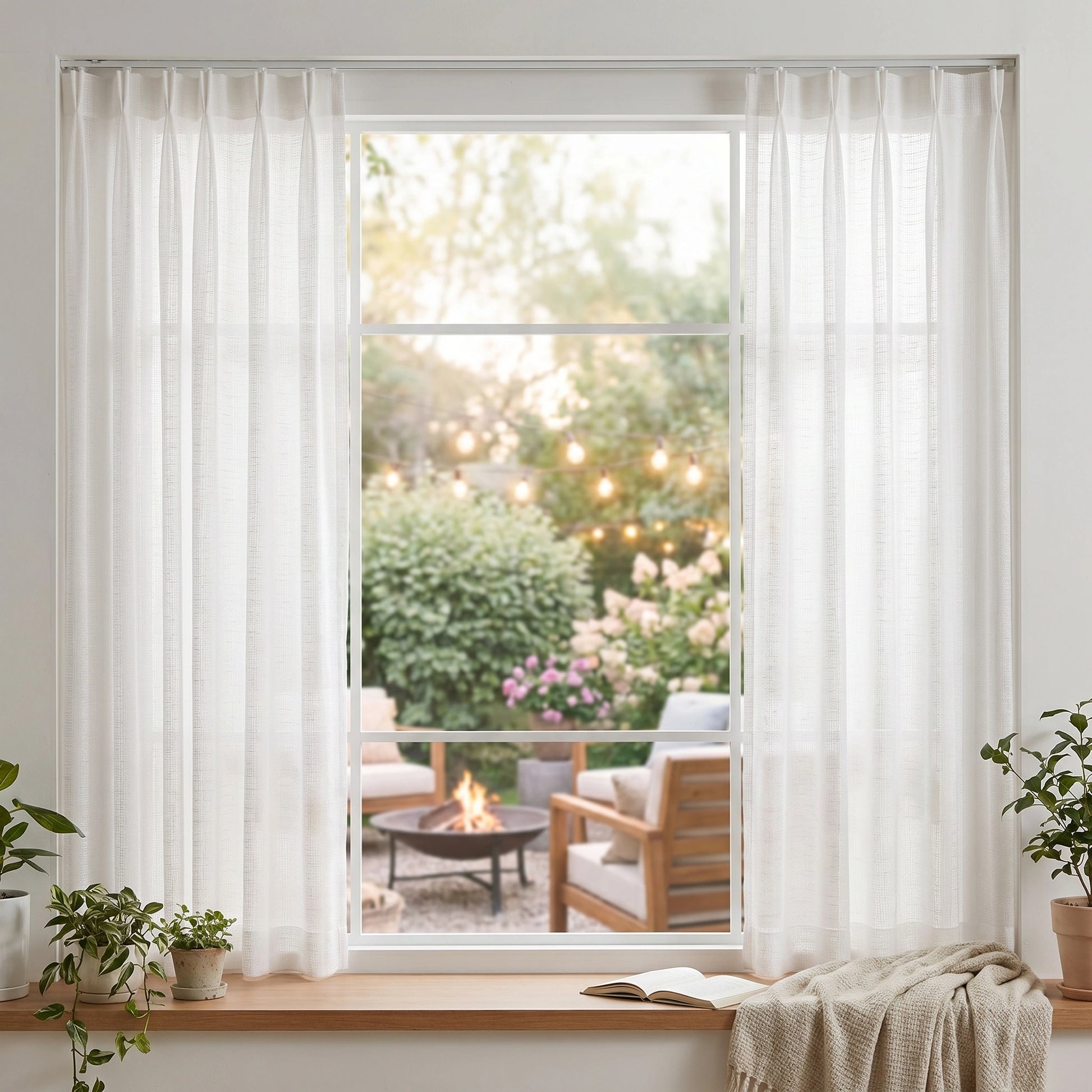 Light beige Theia Linen Sheer Curtains by DWCN Official hanging in a bright living room window, allowing soft natural light to filter through.