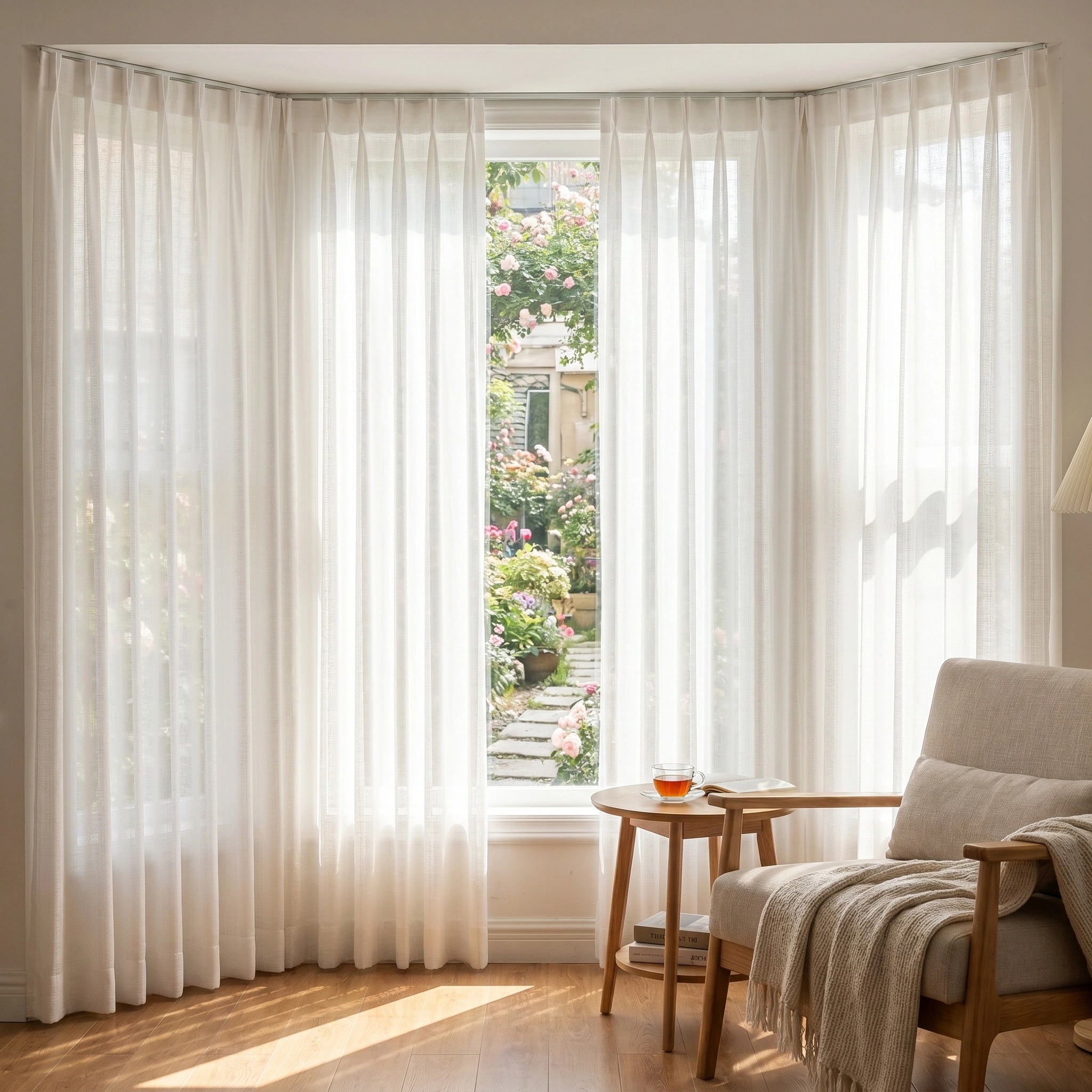Light beige Theia Linen Sheer Curtains by DWCN Official hanging in a bright living room, showcasing airy, semi-transparent fabric for elegant privacy.