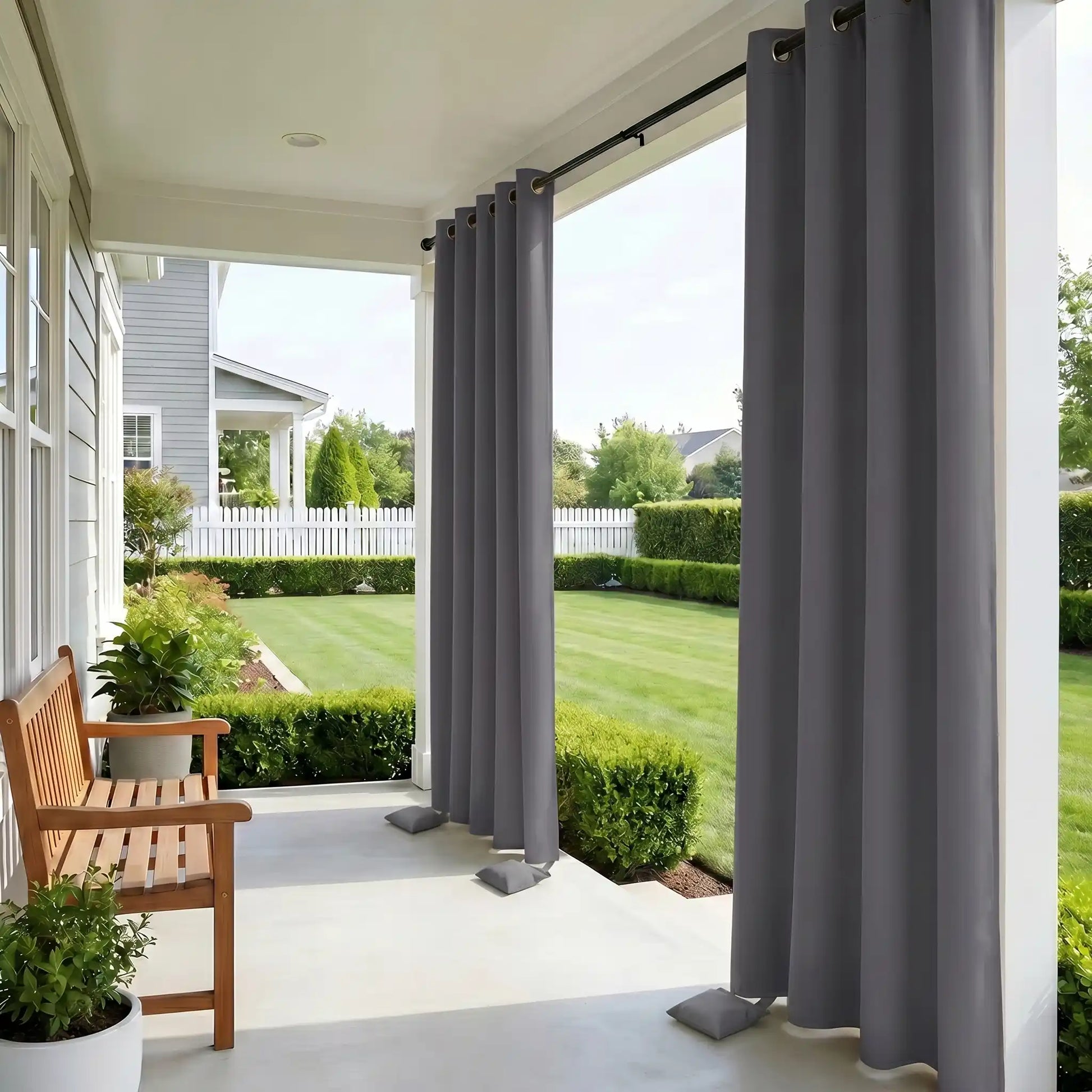 Outdoor waterproof curtain with grommet top and weighted bottom for windproof outdoor use by DWCN Official, shown in the image.