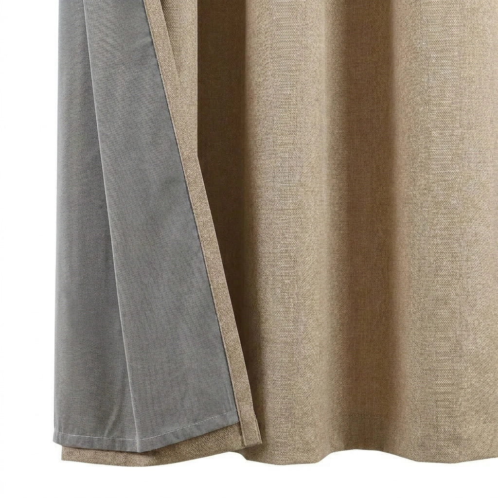 Blackout curtain material with grey lining and beige textured fabric, designed for room privacy, soft light control, and custom blackout curtains.