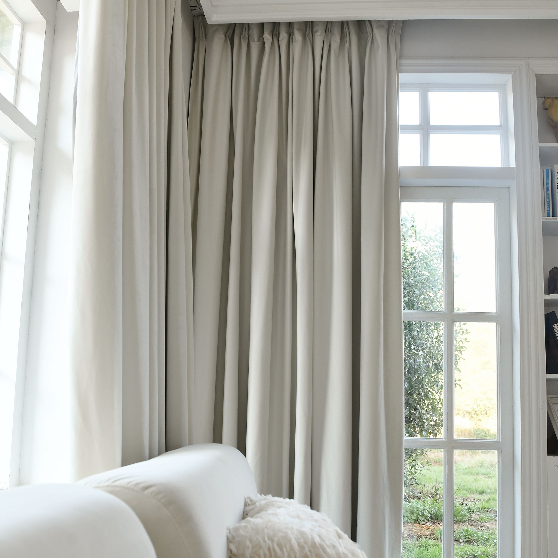 Black velvet blackout curtains by DWCN Official, stylish custom premium drapes blocking sunlight and providing privacy.