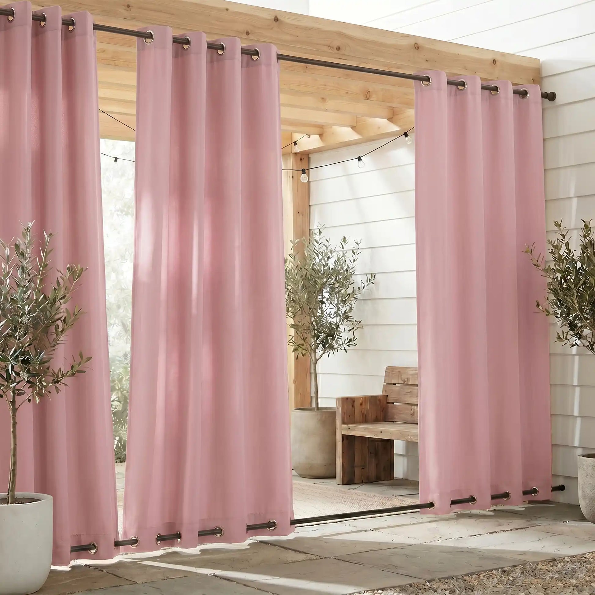 Outdoor curtains with grommet top and bottom, waterproof and windproof design from DWCN Official, shown hanging outdoors.