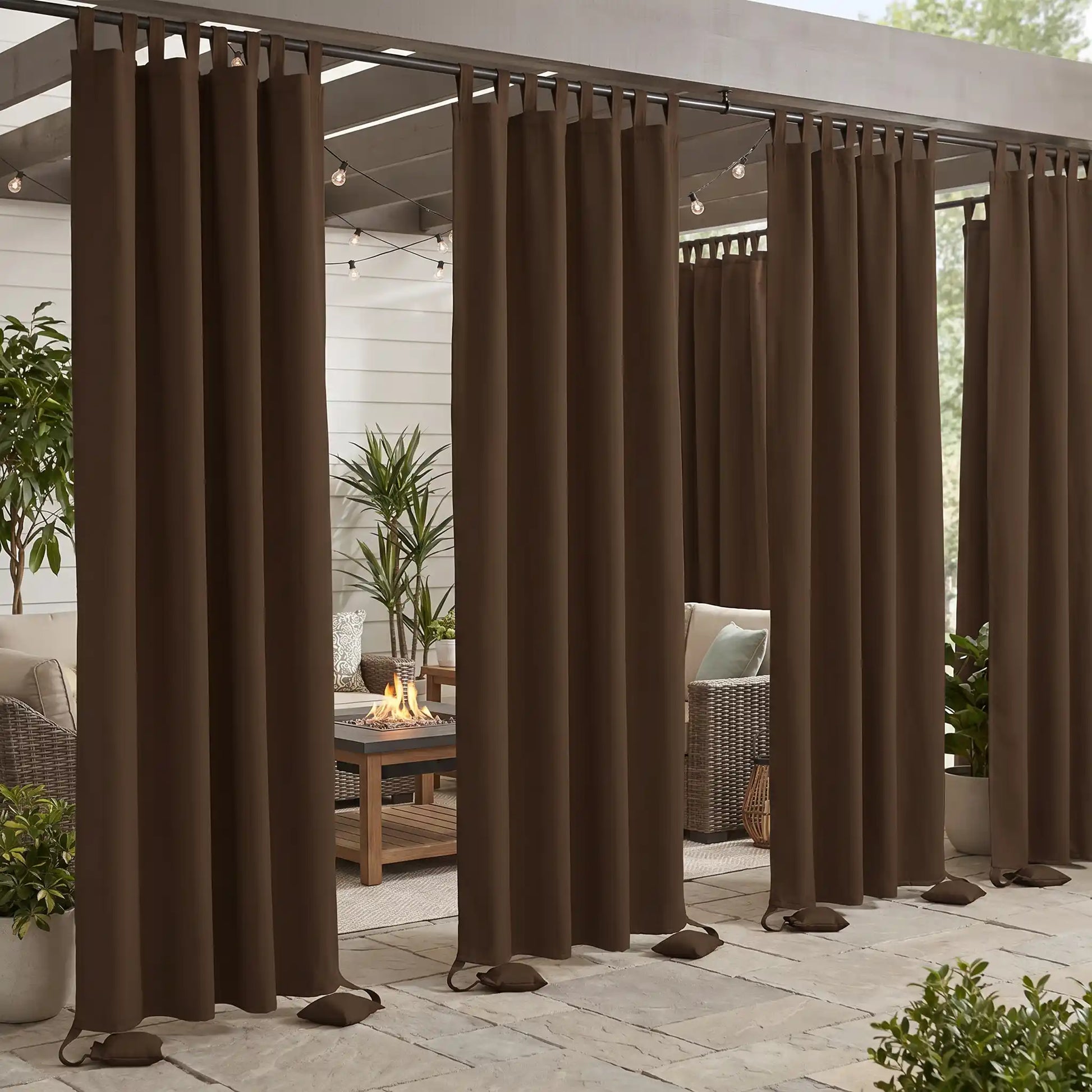 DWCN official windproof and waterproof outdoor curtain with tab top and weighted bags, ideal for weather-resistant outdoor shading.