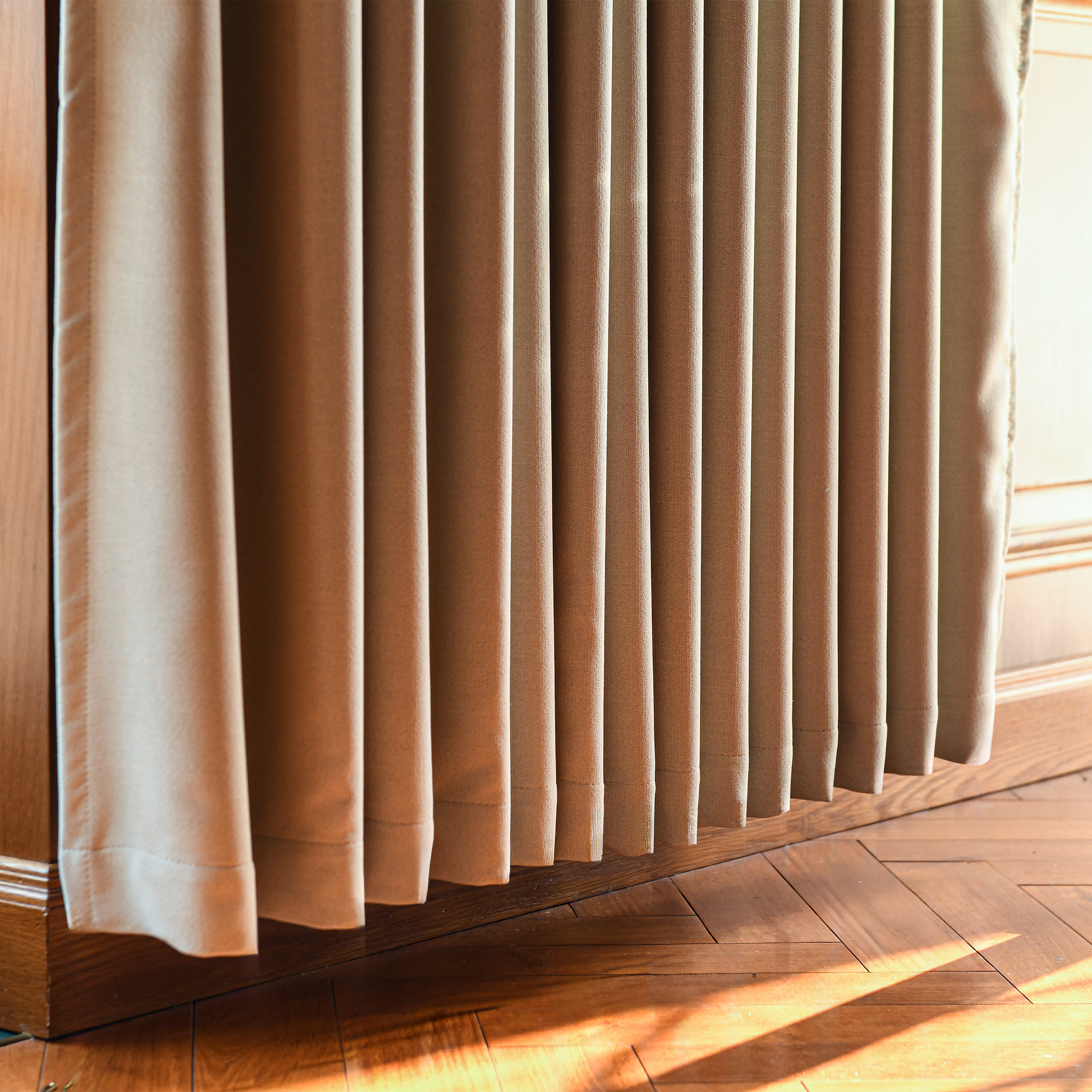Black heavyweight cotton blackout curtains by DWCN Official, showing their thick fabric and dark black color for light blocking.