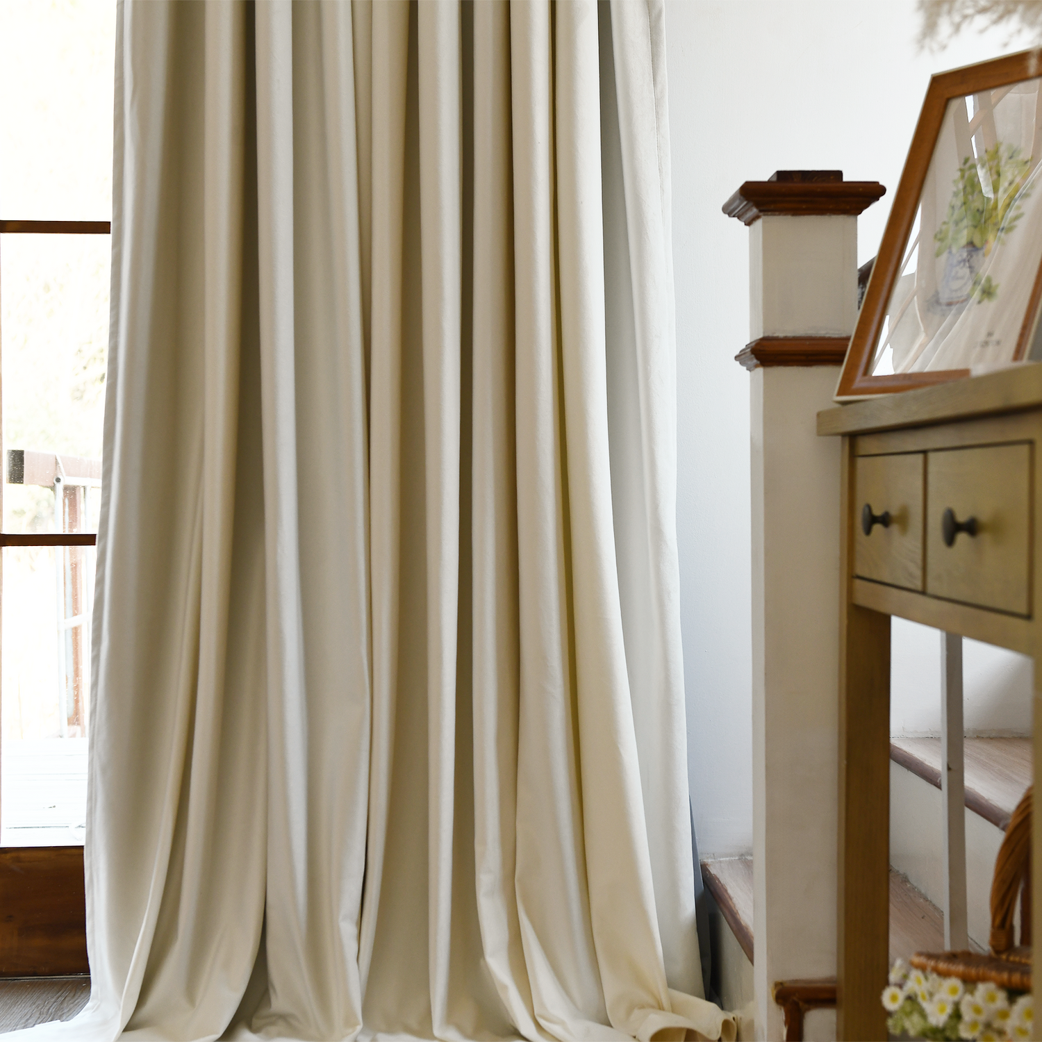 Black velvet blackout curtains by DWCN Official, showcasing their luxurious fabric and elegant design for blocking light.