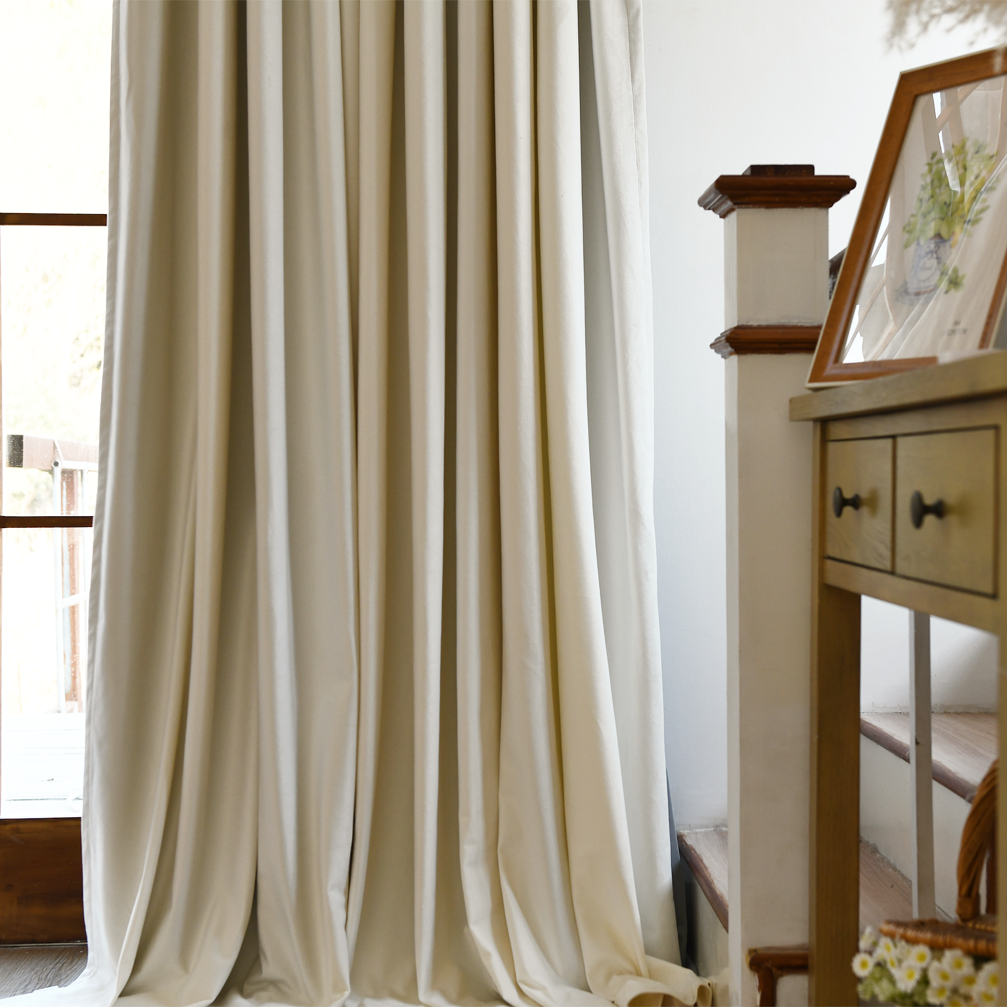 Black velvet blackout curtains by DWCN Official, showcasing their luxurious fabric and elegant design for blocking light.