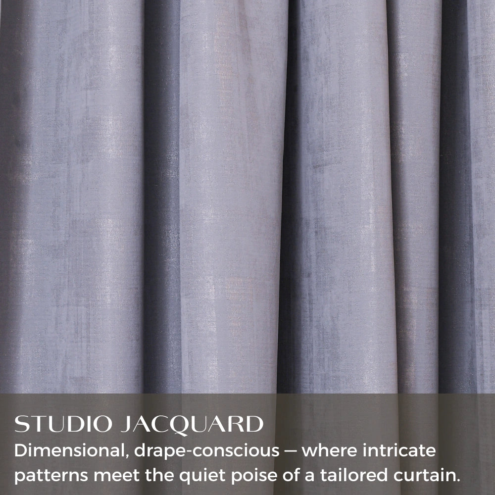 A close-up of DWCN Official Aurelia embroidered-pattern cotton curtain with pencil pleat top, showcasing intricate embroidery and fabric texture.